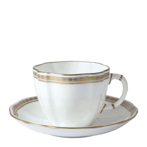 White and gold fine bone china teacup and saucer