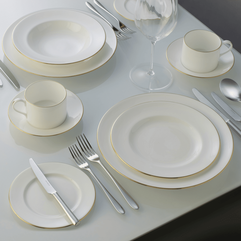White and gold fine bone china table setting
